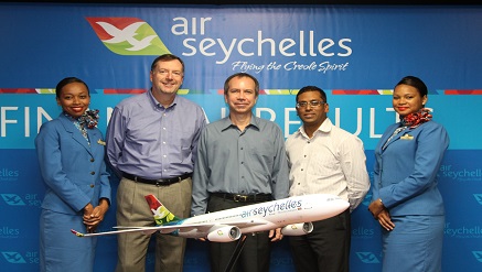 (L-r): Kevin Knight, vice chairman, Air Seychelles, Joël Morgan, Seychelles minister for Home Affairs and Transport and Air Seychelles Board Chairman, Manoj Papa, chief Executive officer, flanked by air-hostesses, during its report presentation recently.